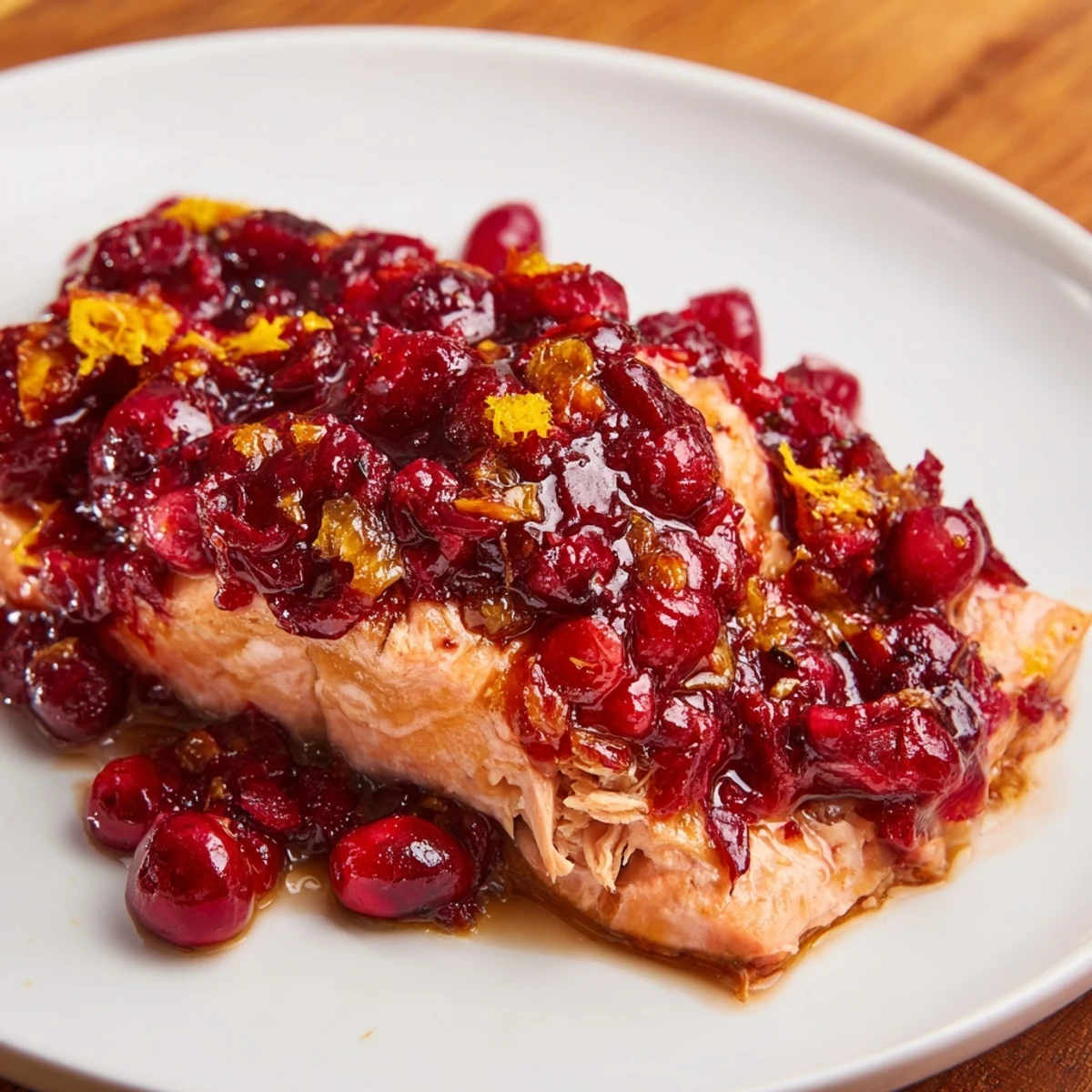 Bright, glazed Cranberry Orange Salmon, flaky and ready to eat, perfect for a special meal at home.