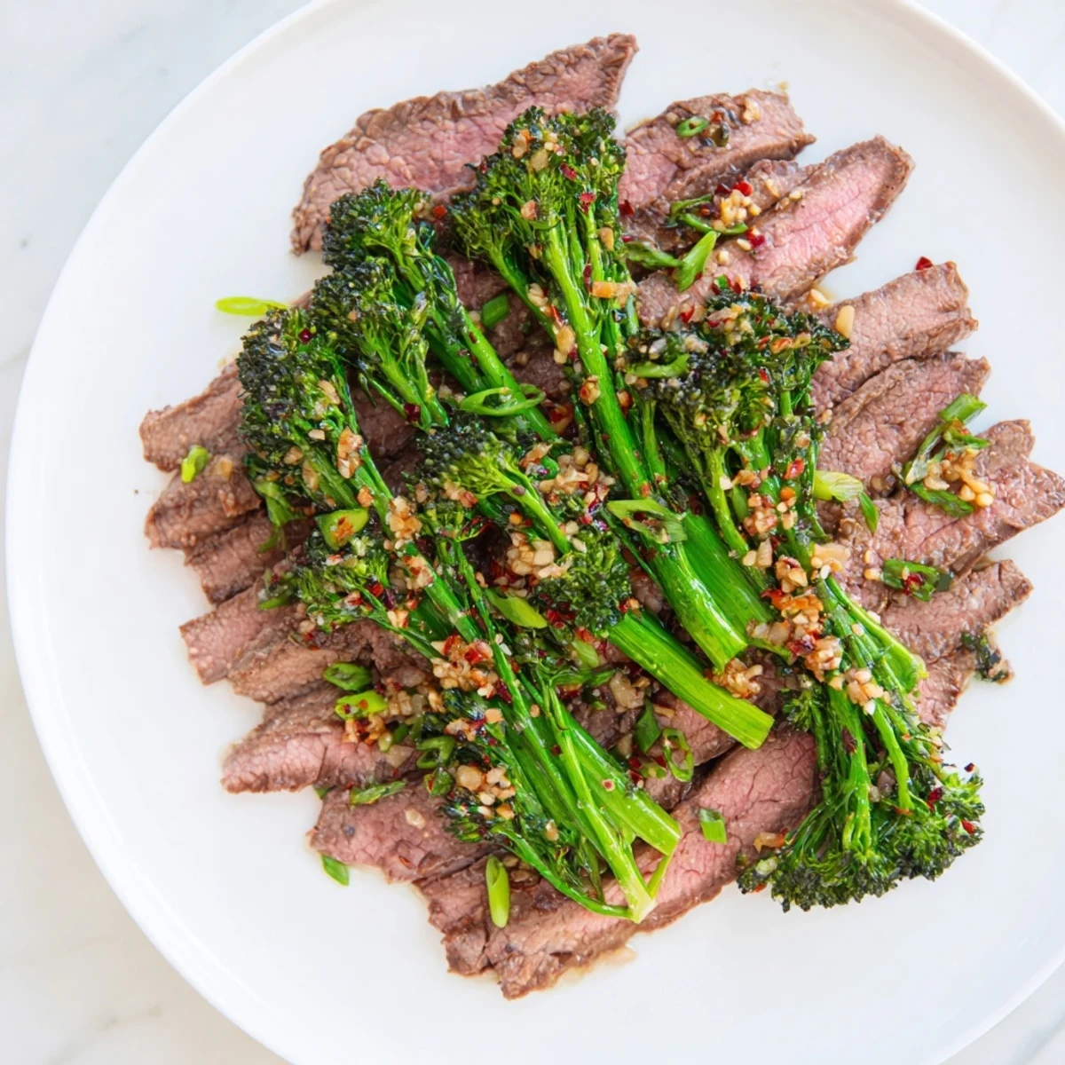 Tender bites of Keto Beef and Broccoli Stir Fry, glistening in a savory sauce.