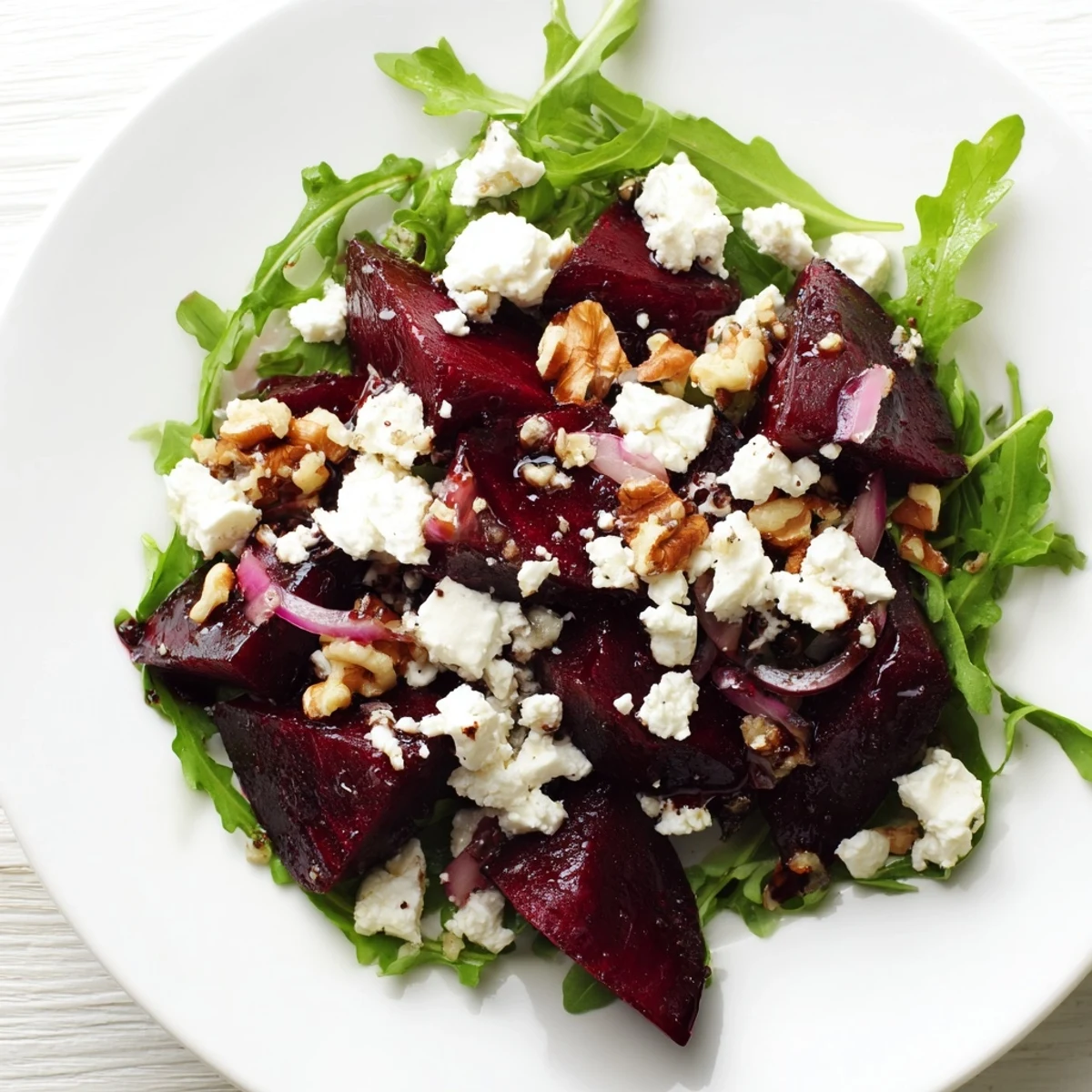 Roasted Beet Salad with Arugula and Feta served ready to eat, perfect alongside grilled chicken or crusty bread.