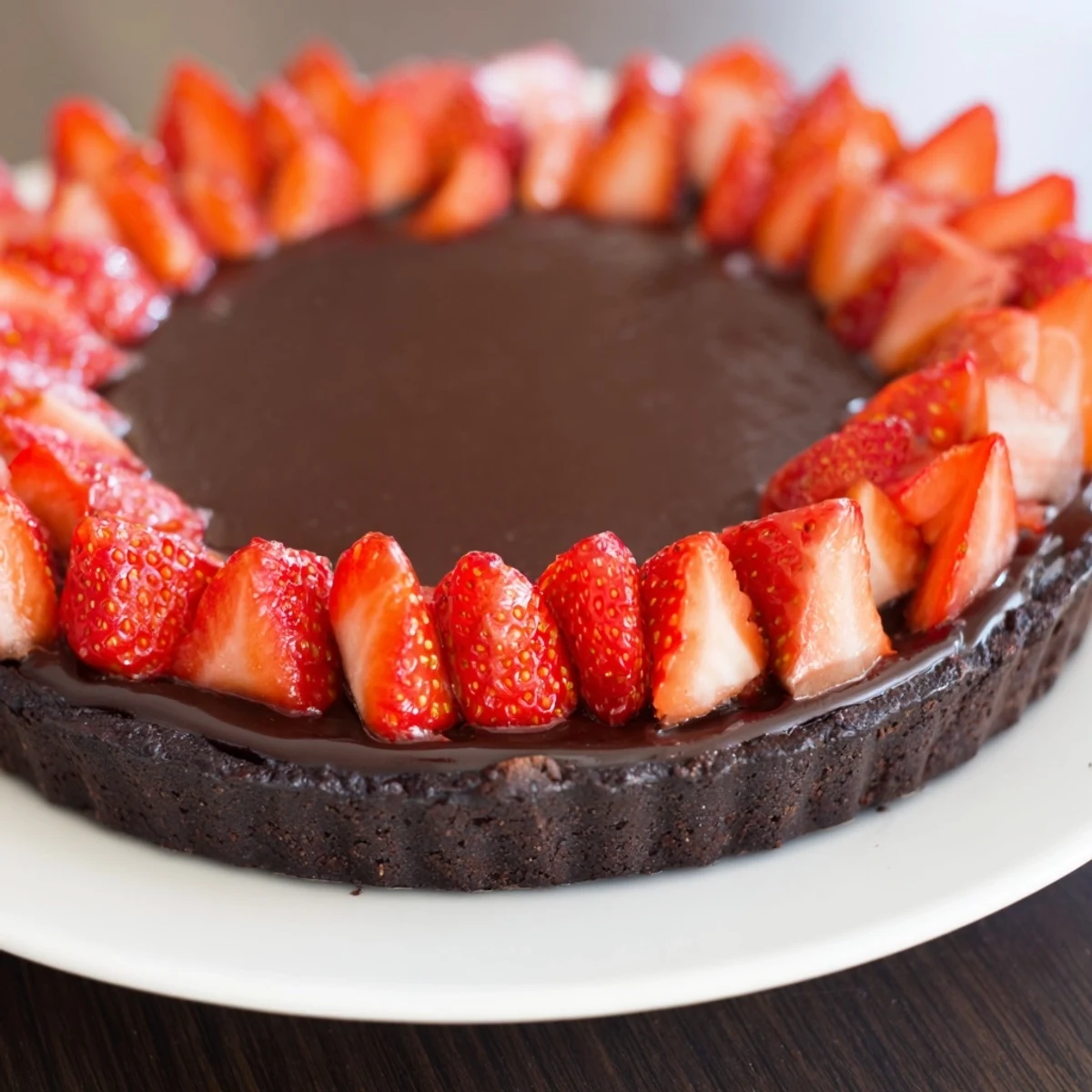 Serve Dark Chocolate Strawberry Tart Recipe warm or chilled, paired with rosé